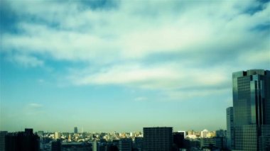 Video of sky, clouds, city and buildings, daytime
