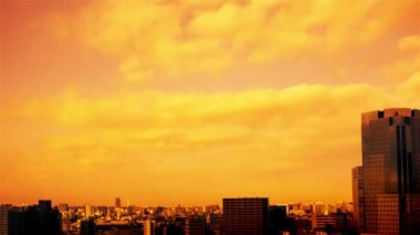 Video of the sky, clouds, towns and buildings, from daytime to sunset