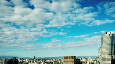 Video of sky, clouds, city and buildings, daytime