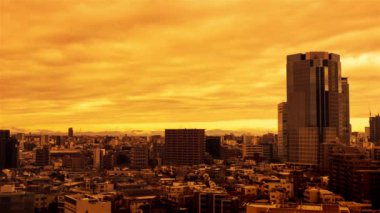 Video of the sky, clouds, towns and buildings, from daytime to sunset