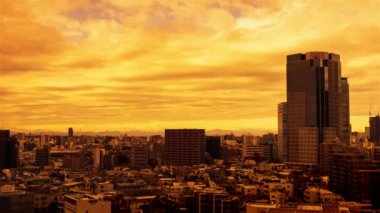 Video of the sky, clouds, towns and buildings, from daytime to sunset