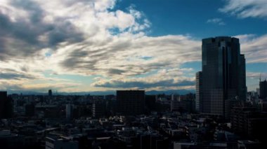 Video of sky, clouds, city and buildings, daytime