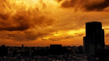 Video of sky, clouds, city and buildings, night view from sunset