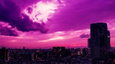 Video of sky, clouds, city and buildings, night view from sunset