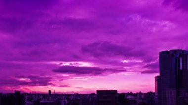 Video of the sky, clouds, towns and buildings, from daytime to sunset