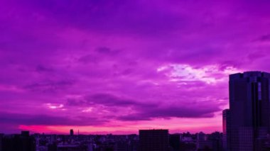Video of the sky, clouds, towns and buildings, from daytime to sunset