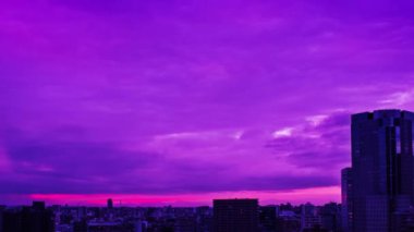 Video of the sky, clouds, towns and buildings, from daytime to sunset