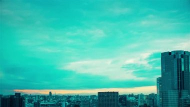 Video of the sky, clouds, towns and buildings, from daytime to sunset