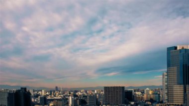 Video of sky, clouds, city and buildings, daytime