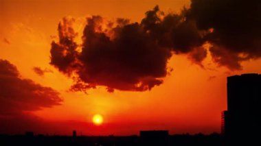 Video of sky, clouds, city and buildings, night view from sunset