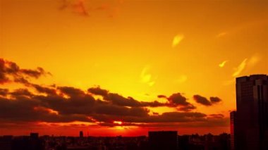 Video of sky, clouds, city and buildings, night view from sunset