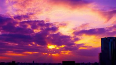 Video of sky, clouds, city and buildings, night view from sunset