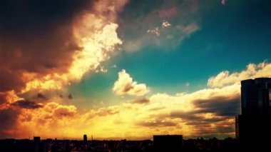 Video of the sky, clouds, towns and buildings, from daytime to sunset