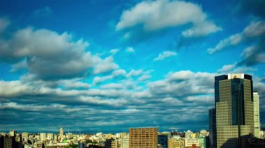 Video of sky, clouds, city and buildings, daytime