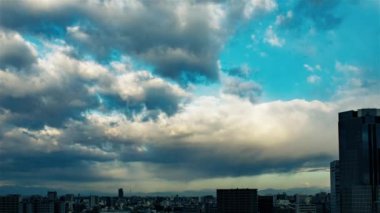 Video of sky, clouds, city and buildings, daytime