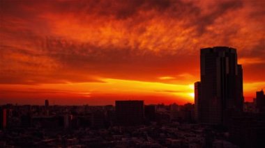 Video of sky, clouds, city and buildings, night view from sunset