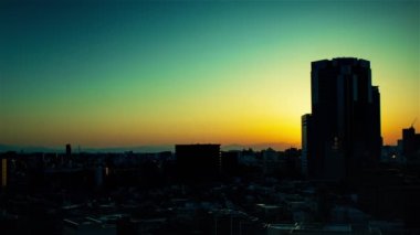 Video of sky, clouds, city and buildings, night view from sunset