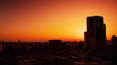 Video of sky, clouds, city and buildings, night view from sunset