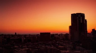 Video of sky, clouds, city and buildings, night view from sunset