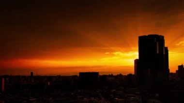 Video of sky, clouds, city and buildings, night view from sunset