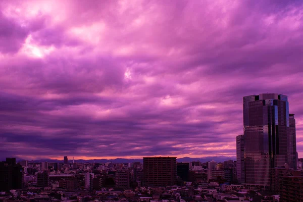 stock image Images of sky, clouds, city and buildings, from daytime to sunset