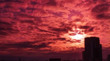 Video of the sky, clouds, towns and buildings, from daytime to sunset