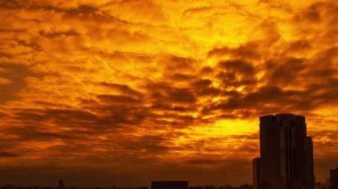 Video of the sky, clouds, towns and buildings, from daytime to sunset