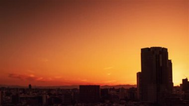 Video of sky, clouds, city and buildings, night view from sunset