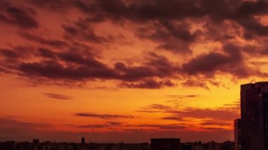 Video of sky, clouds, city and buildings, night view from sunset