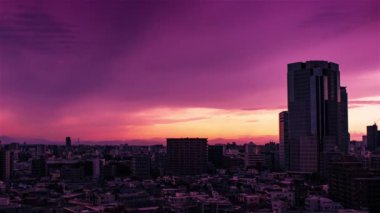 Video of the sky, clouds, towns and buildings, from daytime to sunset