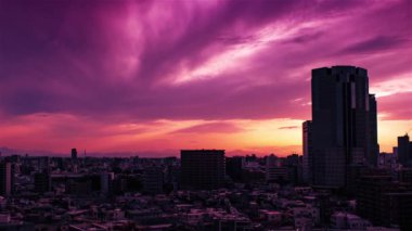 Video of the sky, clouds, towns and buildings, from daytime to sunset
