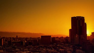Video of sky, clouds, city and buildings, night view from sunset