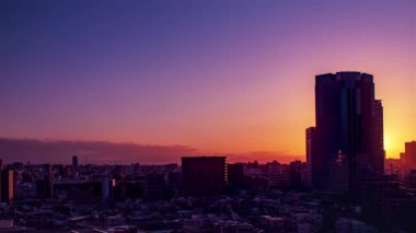 Video of sky, clouds, city and buildings, night view from sunset