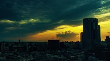 Video of sky, clouds, city and buildings, night view from sunset