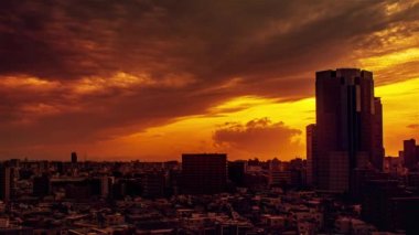 Video of sky, clouds, city and buildings, night view from sunset