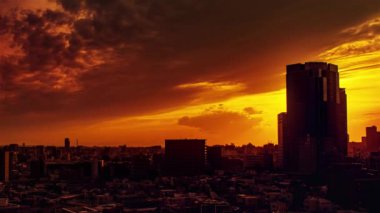 Video of sky, clouds, city and buildings, night view from sunset