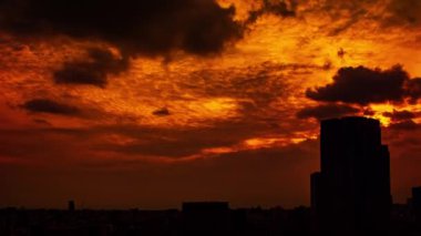 Video of sky, clouds, city and buildings, night view from sunset