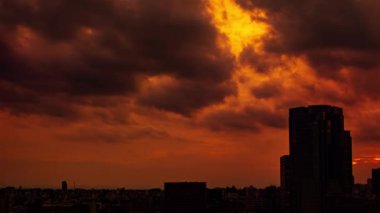 Video of sky, clouds, city and buildings, night view from sunset