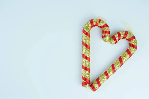 Stock image Gold and red candy cans with glitter on white background isolated with selected focus