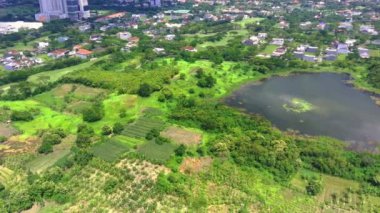 Aerial view of lake banyu mumbul in Menganti, Gresik, Indonesia. Drone footage.