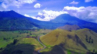 Aerial view of Kawah Wurung grass lands in Bondowoso, East Java. Indonesia. Drone footage.