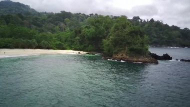 Flying over Teluk Ijo or Green Bay in Banyuwangi. east java. Aerial footage.