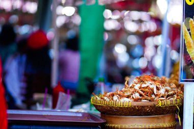 Street foods displays around Sam Poo Kong Temple. Semarang. Indonesia. In Chinese New Year 2023. Street Photography.