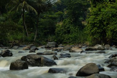 Rocky river stream of Kali Bojong, Salatiga, Central Java. Indonesia. Long Exposure Photography. Blurred motions.