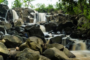 curug gamelan in Salatiga, Central Java. Indonesia. Waerfalls with giant rocks. Long Exposure Photography. Blurred Motions.