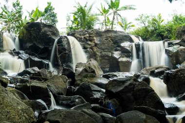curug gamelan in Salatiga, Central Java. Indonesia. Waerfalls with giant rocks. Long Exposure Photography. Blurred Motions.
