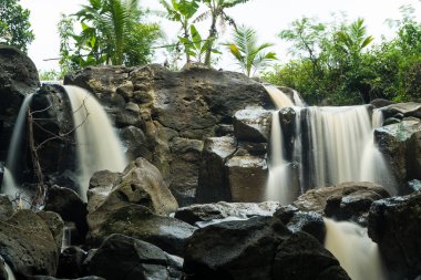 curug gamelan in Salatiga, Central Java. Indonesia. Waerfalls with giant rocks. Long Exposure Photography. Blurred Motions.