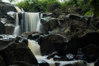 curug gamelan in Salatiga, Central Java. Indonesia. Waerfalls with giant rocks. Long Exposure Photography. Blurred Motions.