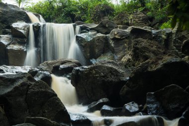 curug gamelan in Salatiga, Central Java. Indonesia. Waerfalls with giant rocks. Long Exposure Photography. Blurred Motions.