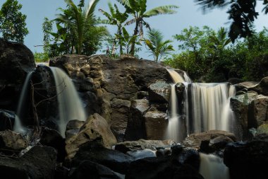 curug gamelan in Salatiga, Central Java. Indonesia. Waerfalls with giant rocks. Long Exposure Photography. Blurred Motions.